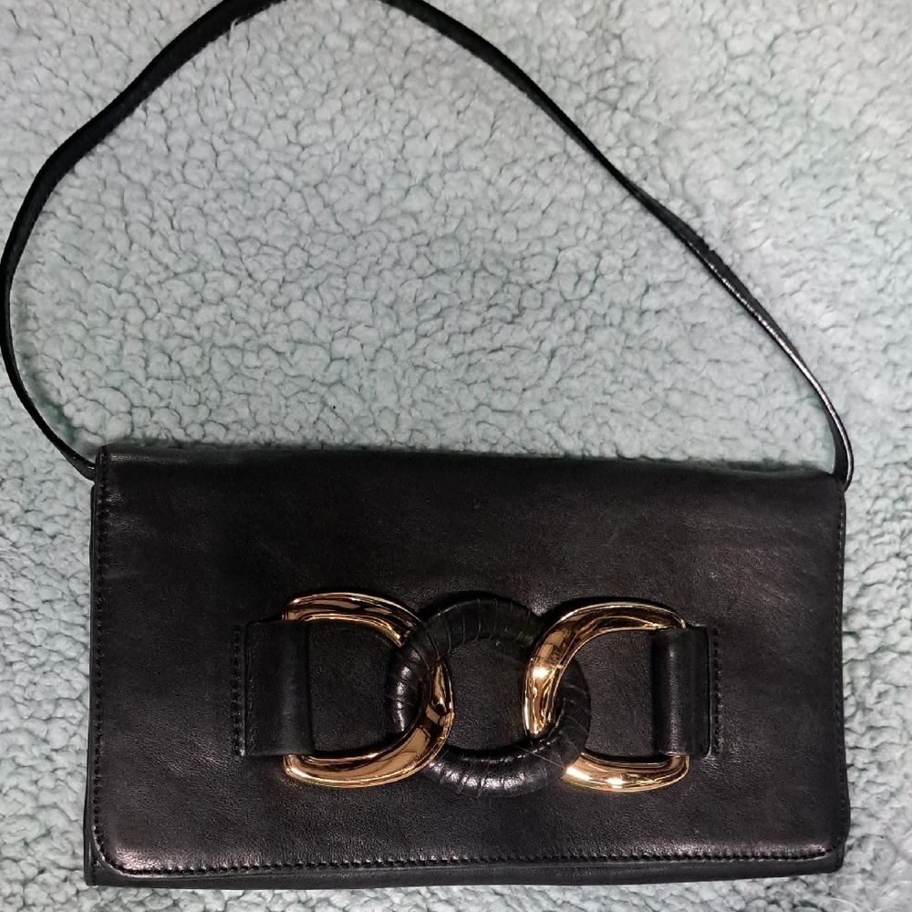 Michael Kors Black and Gold Clutch with Sleek Design